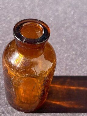 THE ANTIDOLAR MFG. CO.- SPRINGVILLE, NEW YORK VINTAGE MEDICINE BOTTLE